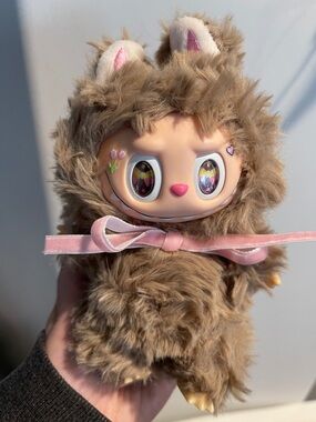 Doll in Fluffy Light Brown Fur with Pink Bow Labubu
